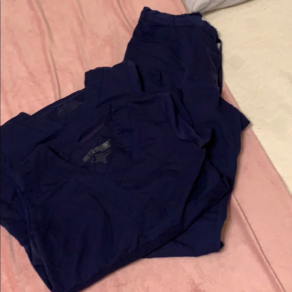 2 scrub tops one scrub bottom